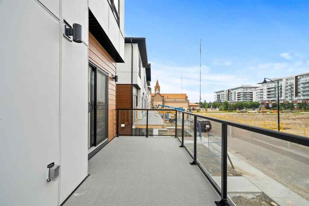 MLS® A2255576 - 8349 8 Avenue SW in West Springs Calgary, Residential