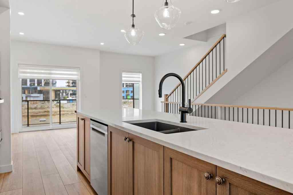 MLS® A2255576 - 8349 8 Avenue SW in West Springs Calgary, Residential