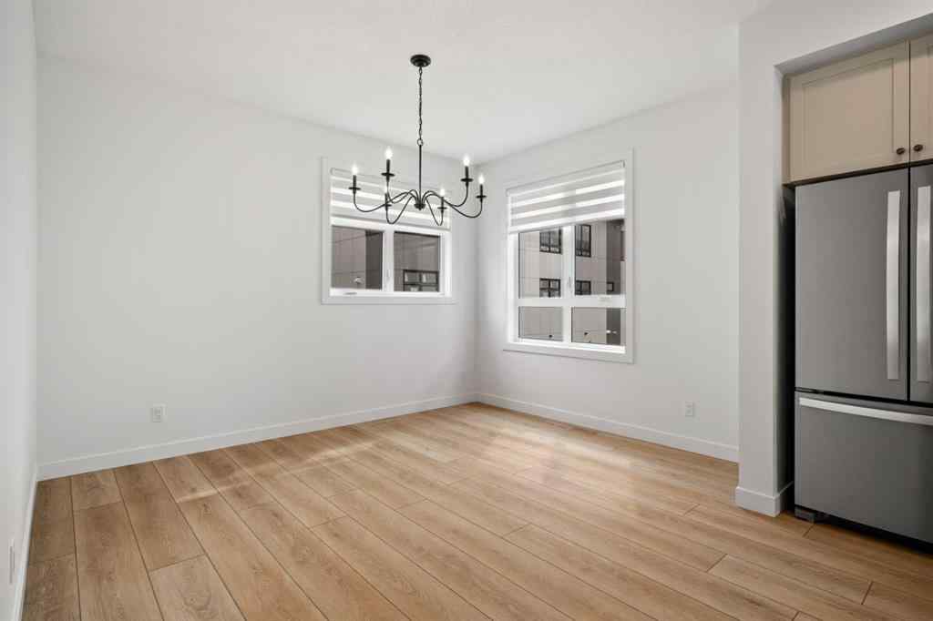 MLS® A2255576 - 8349 8 Avenue SW in West Springs Calgary, Residential