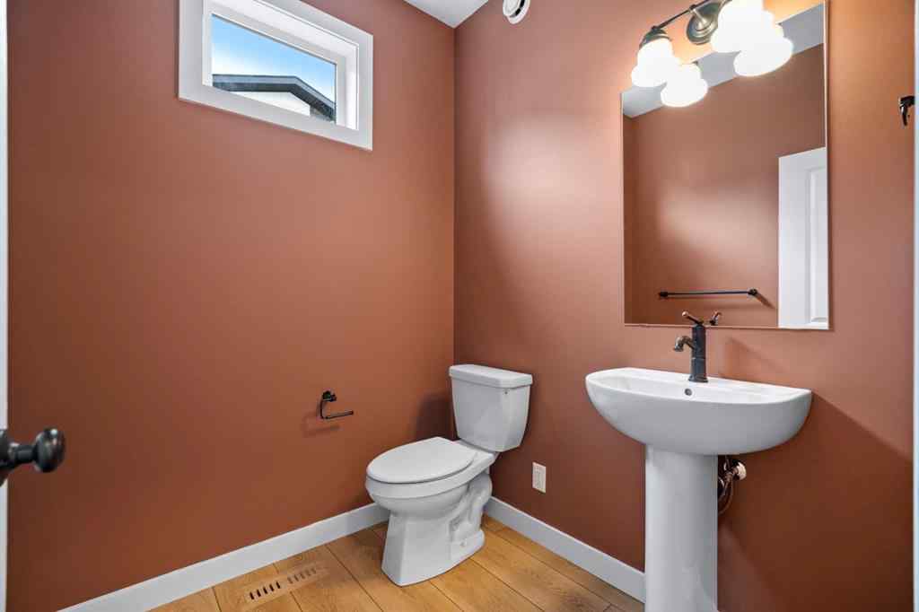 MLS® A2255576 - 8349 8 Avenue SW in West Springs Calgary, Residential