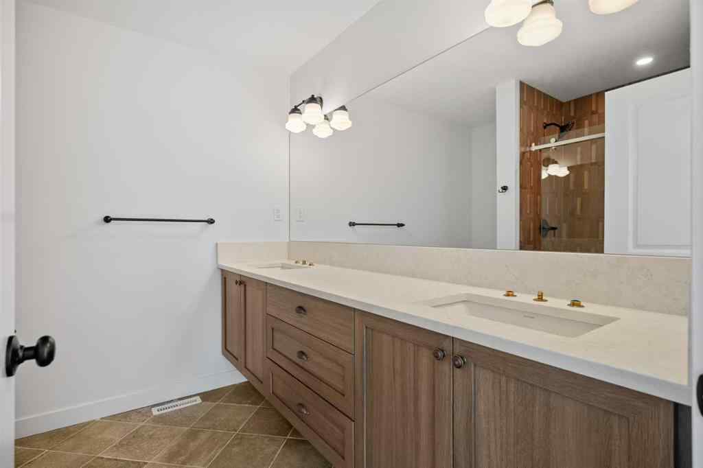 MLS® A2255576 - 8349 8 Avenue SW in West Springs Calgary, Residential