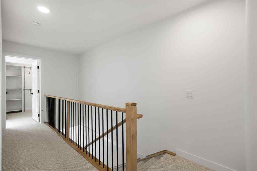 MLS® A2255576 - 8349 8 Avenue SW in West Springs Calgary, Residential