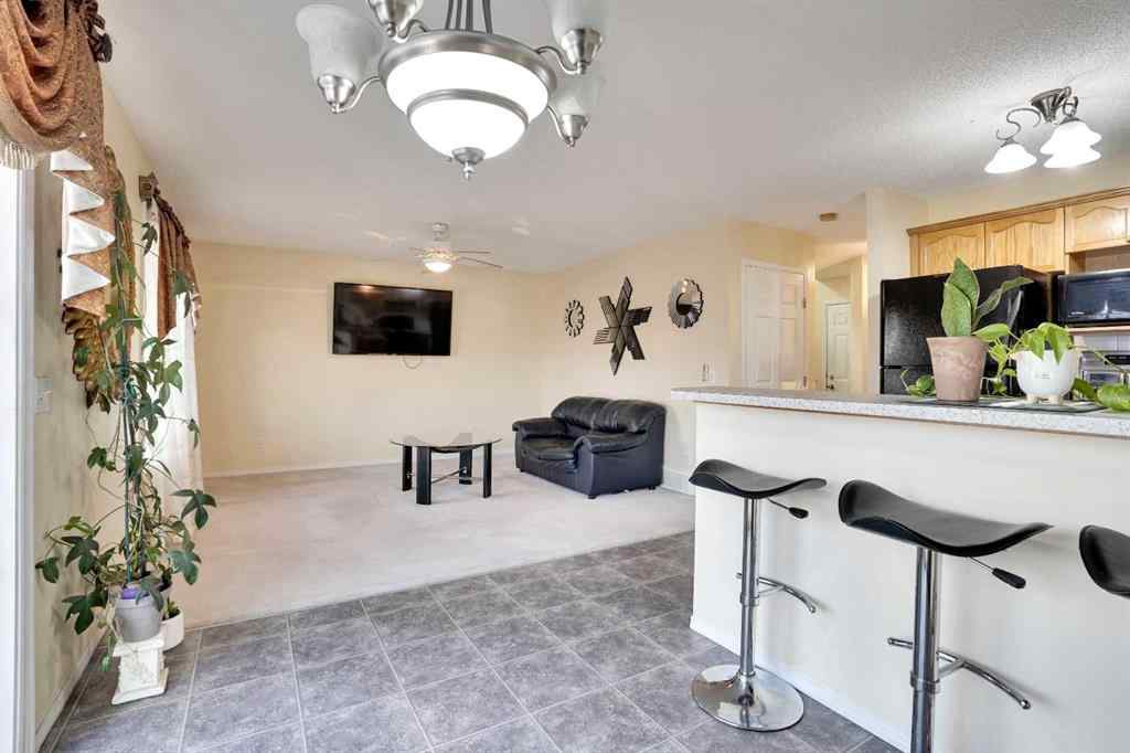 MLS® A2255596 - 27 Saddlemont Manor NE in Saddle Ridge Calgary, Residential
