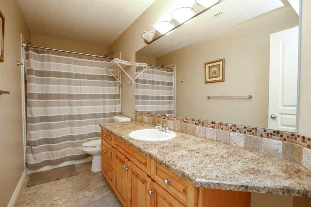 MLS® A2255598 - 49 Leung Close  in Lancaster Green Red Deer, Residential