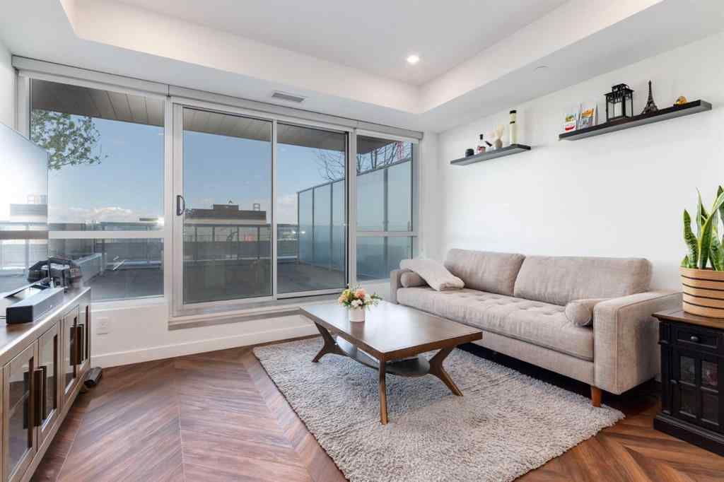 MLS® A2255603 - Unit #215 8505 Broadcast Avenue SW in West Springs Calgary, Residential