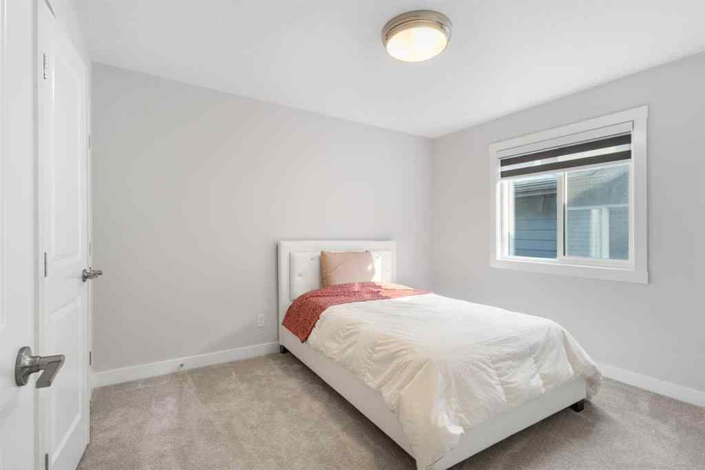 MLS® A2255619 - 246 West Grove Point SW in West Springs Calgary, Residential