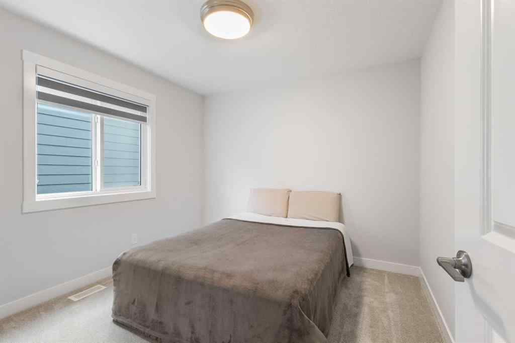 MLS® A2255619 - 246 West Grove Point SW in West Springs Calgary, Residential