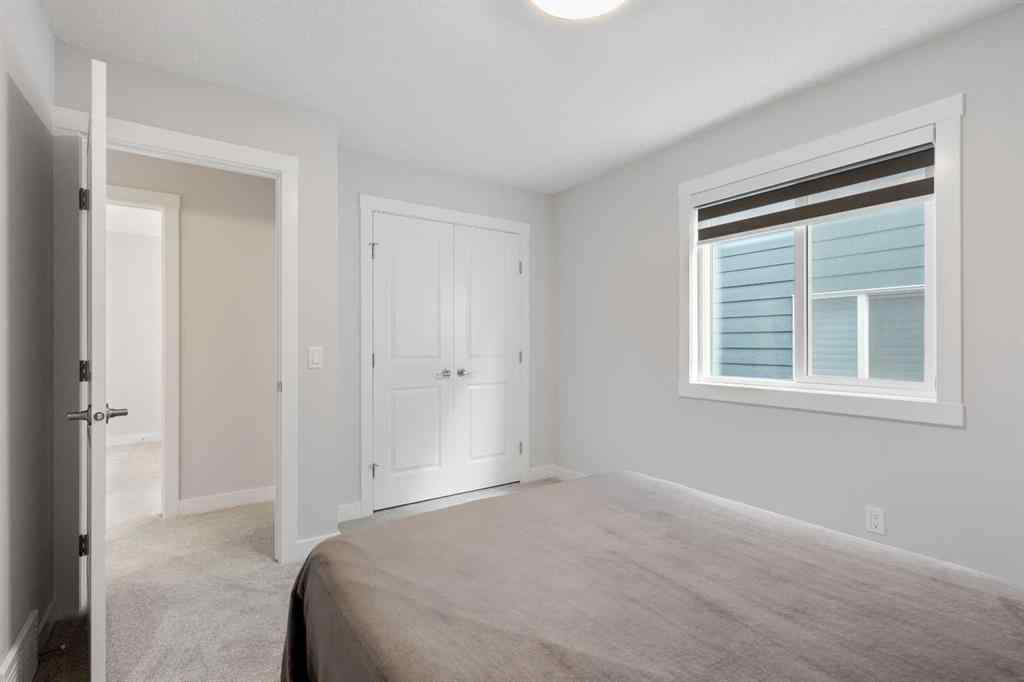 MLS® A2255619 - 246 West Grove Point SW in West Springs Calgary, Residential