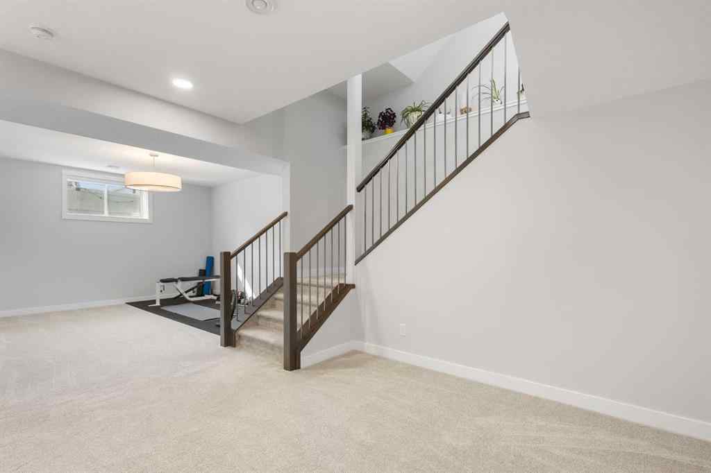 MLS® A2255619 - 246 West Grove Point SW in West Springs Calgary, Residential