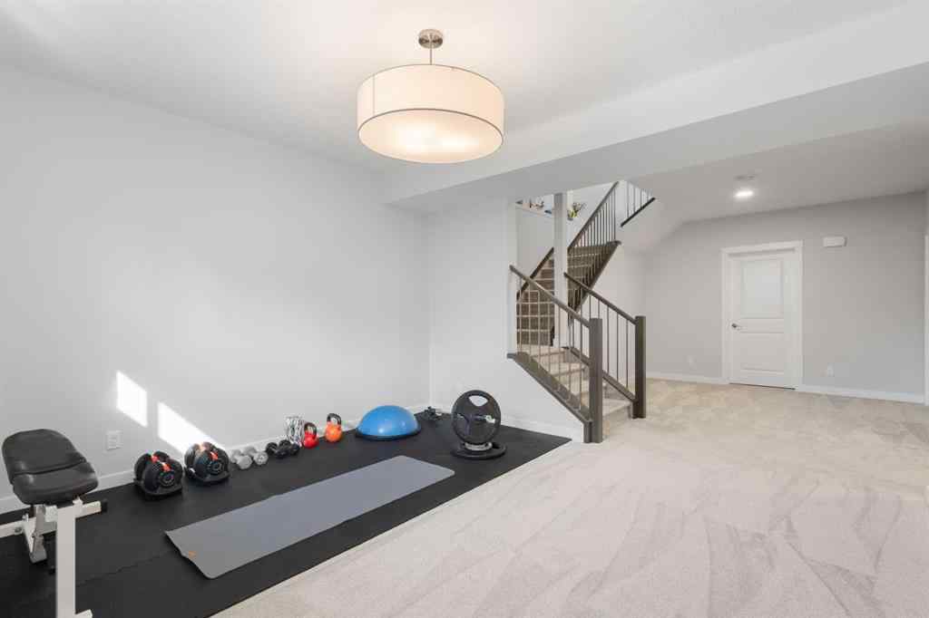 MLS® A2255619 - 246 West Grove Point SW in West Springs Calgary, Residential