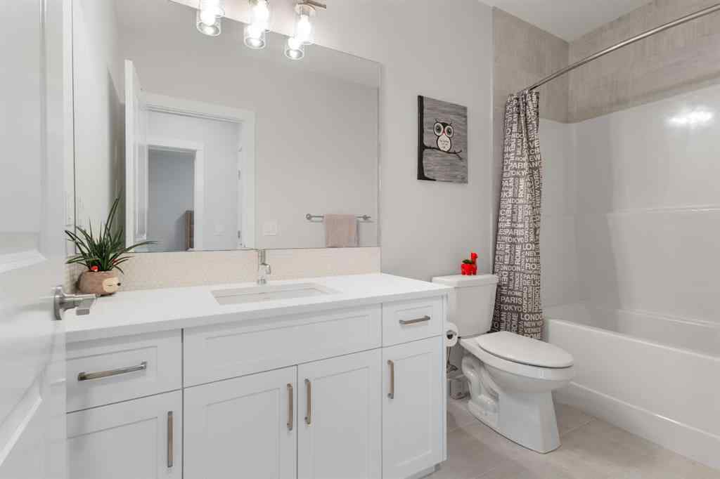 MLS® A2255619 - 246 West Grove Point SW in West Springs Calgary, Residential