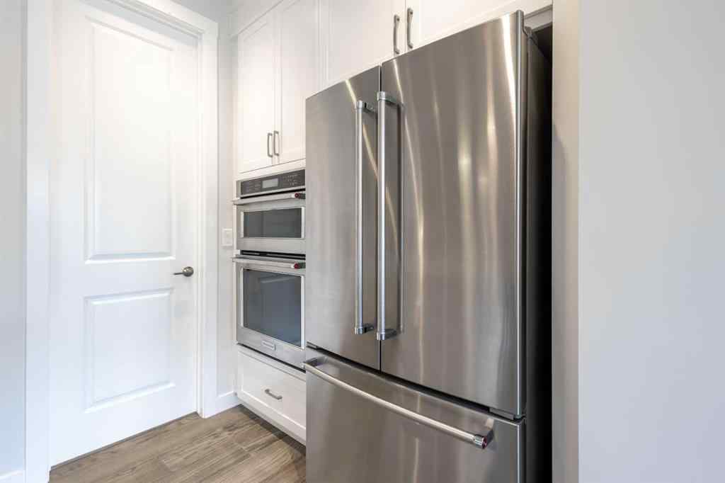MLS® A2255619 - 246 West Grove Point SW in West Springs Calgary, Residential