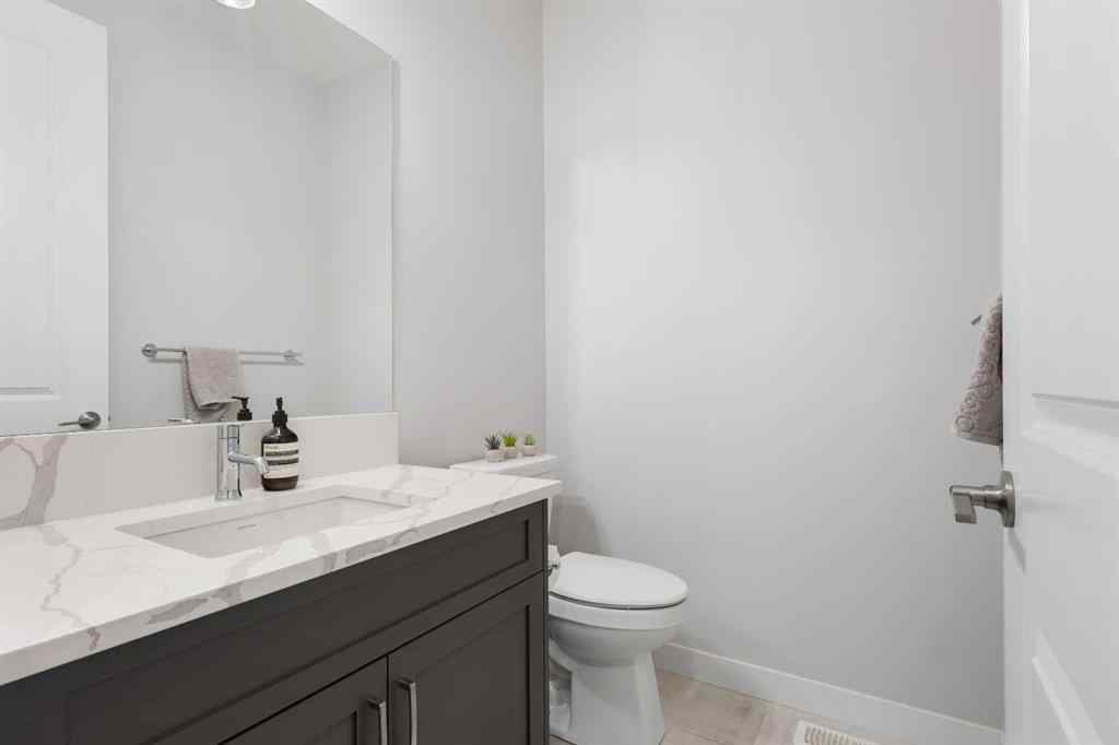 MLS® A2255619 - 246 West Grove Point SW in West Springs Calgary, Residential