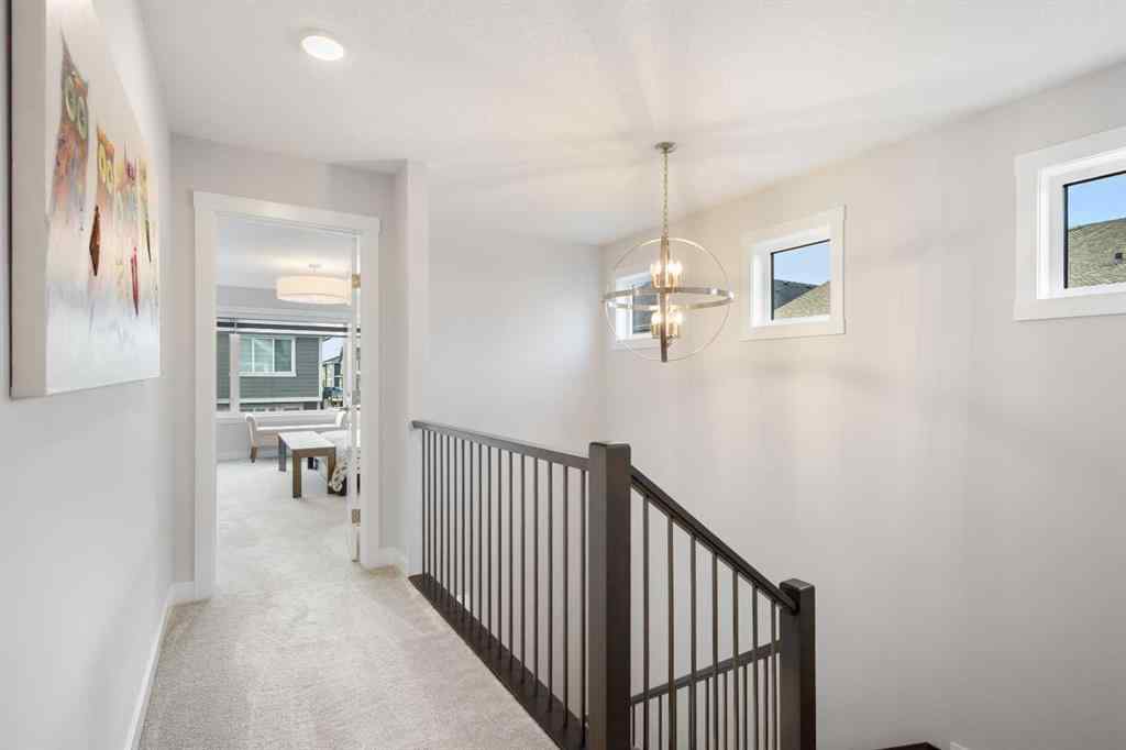 MLS® A2255619 - 246 West Grove Point SW in West Springs Calgary, Residential