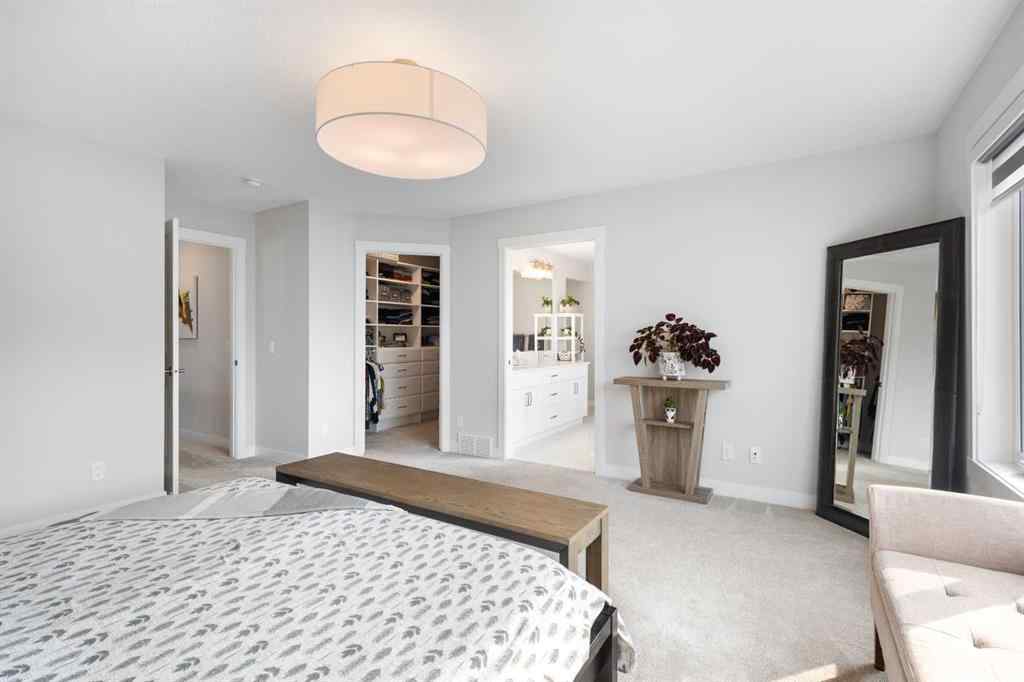MLS® A2255619 - 246 West Grove Point SW in West Springs Calgary, Residential