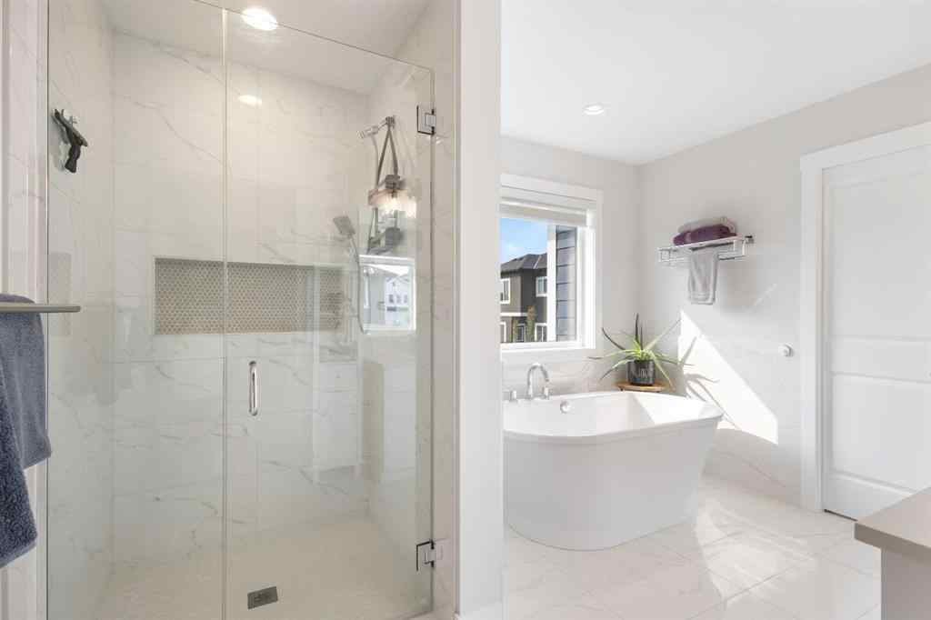 MLS® A2255619 - 246 West Grove Point SW in West Springs Calgary, Residential