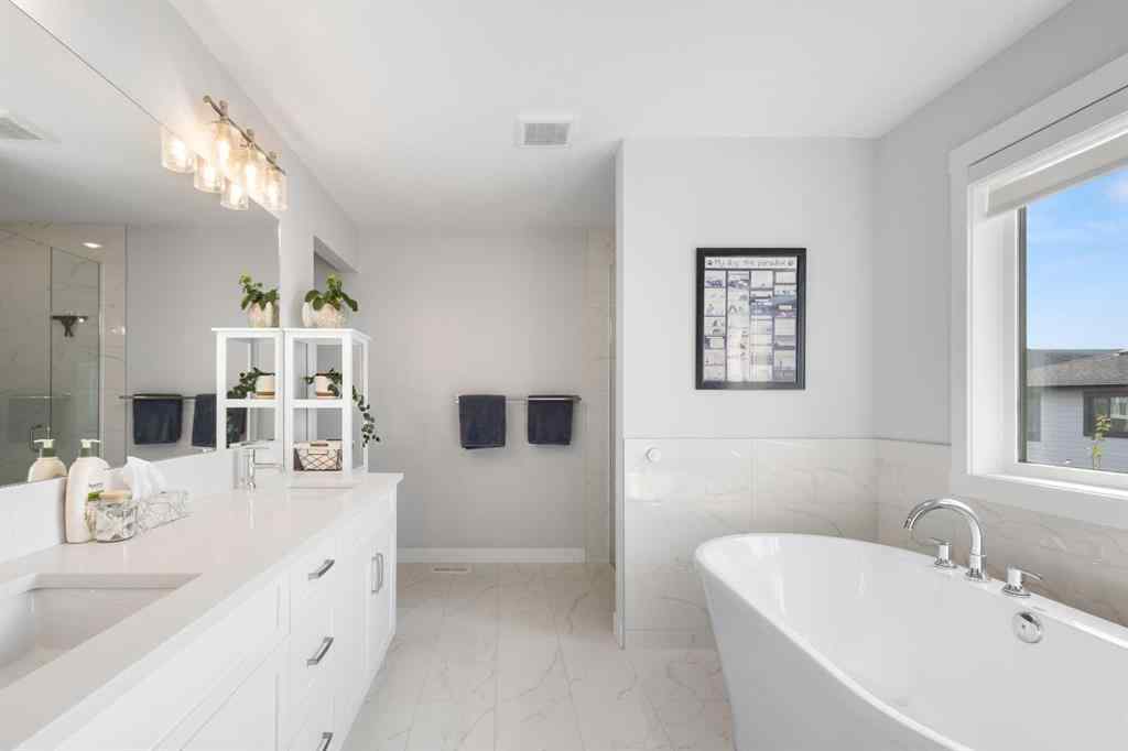 MLS® A2255619 - 246 West Grove Point SW in West Springs Calgary, Residential