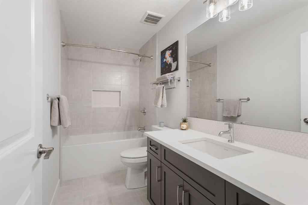 MLS® A2255619 - 246 West Grove Point SW in West Springs Calgary, Residential