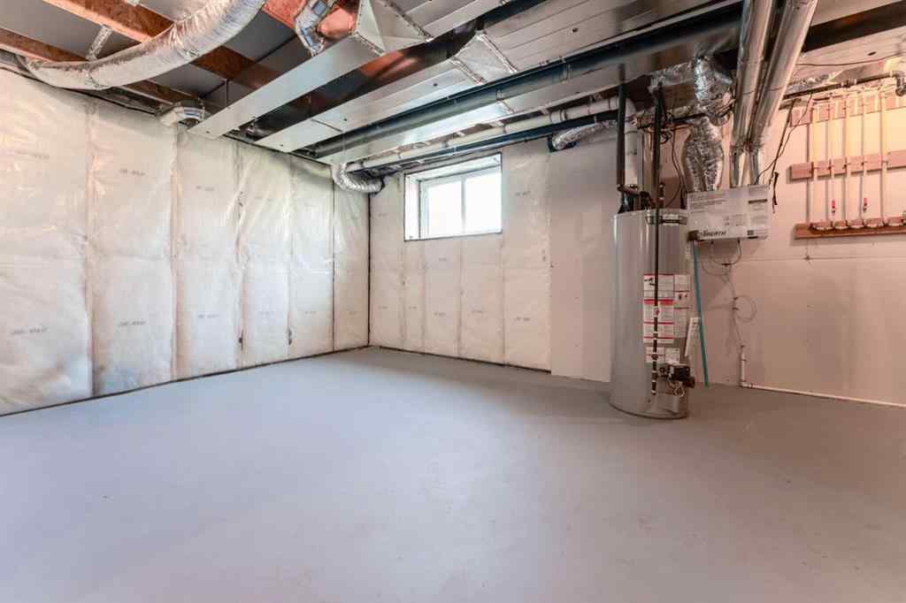 MLS® A2255625 - 200 Lewiston Drive NE in Lewisburg Calgary, Residential