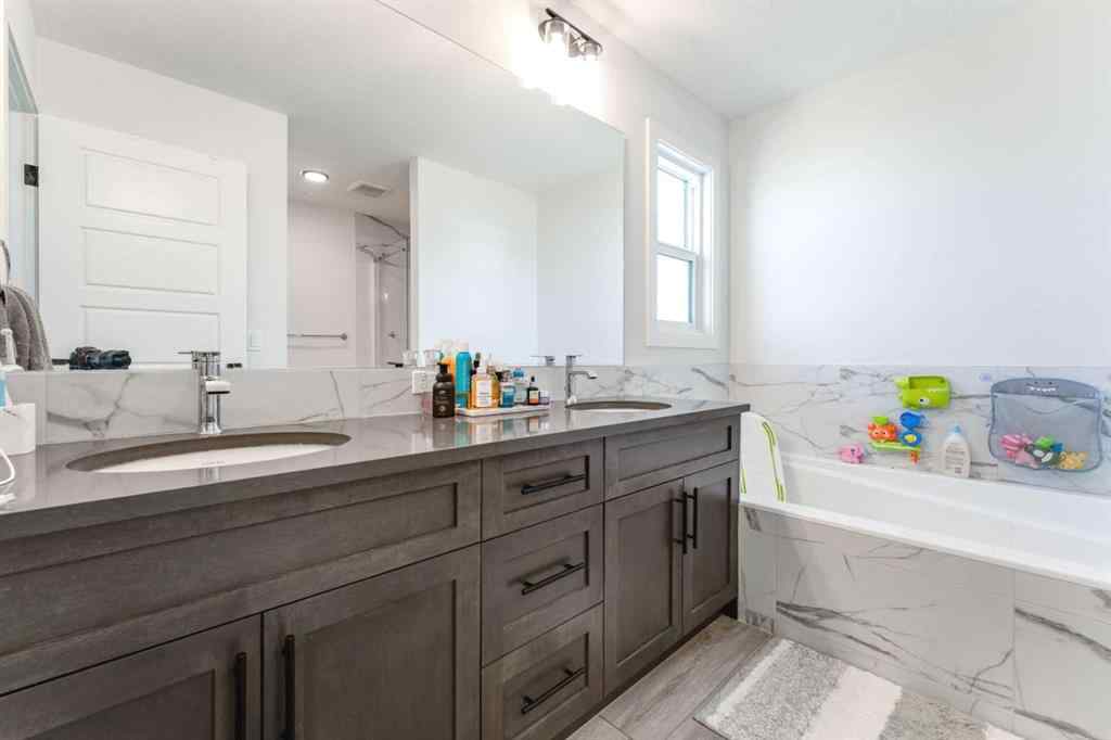 MLS® A2255625 - 200 Lewiston Drive NE in Lewisburg Calgary, Residential