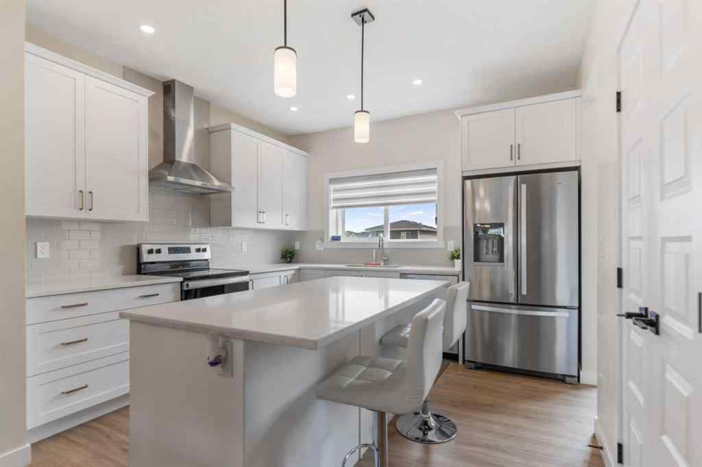 MLS® A2255639 - 746 Bayview Hill SW in Bayview Airdrie, Residential