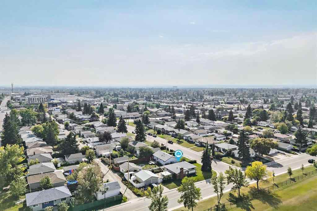 MLS® A2255653 - 1502 49 Street SE in Forest Lawn Calgary, Residential