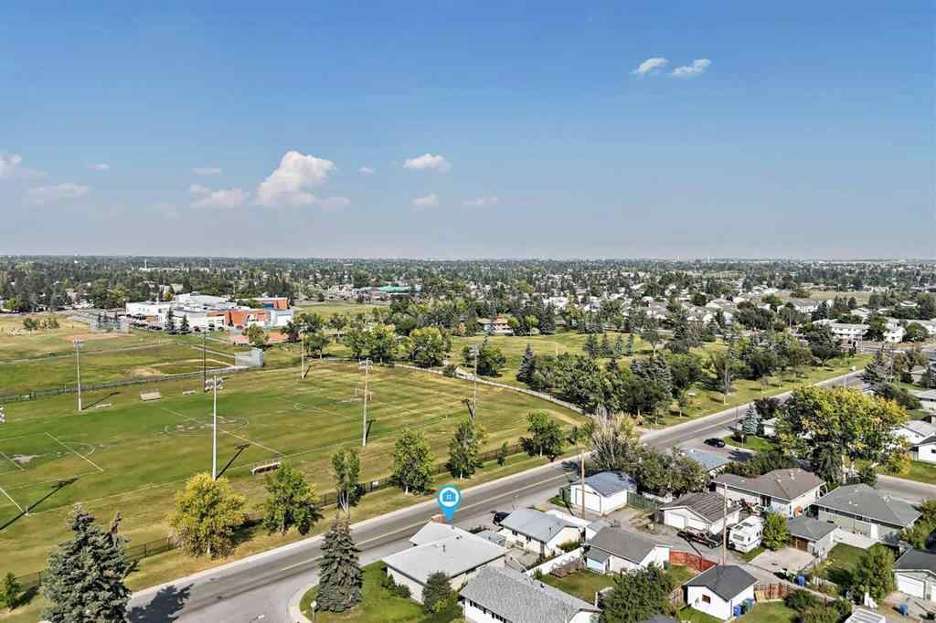 MLS® A2255653 - 1502 49 Street SE in Forest Lawn Calgary, Residential