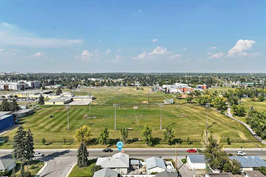 MLS® A2255653 - 1502 49 Street SE in Forest Lawn Calgary, Residential