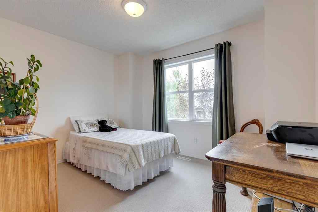 MLS® A2255658 - 7204 Sierra Morena Boulevard SW in Signal Hill Calgary, Residential