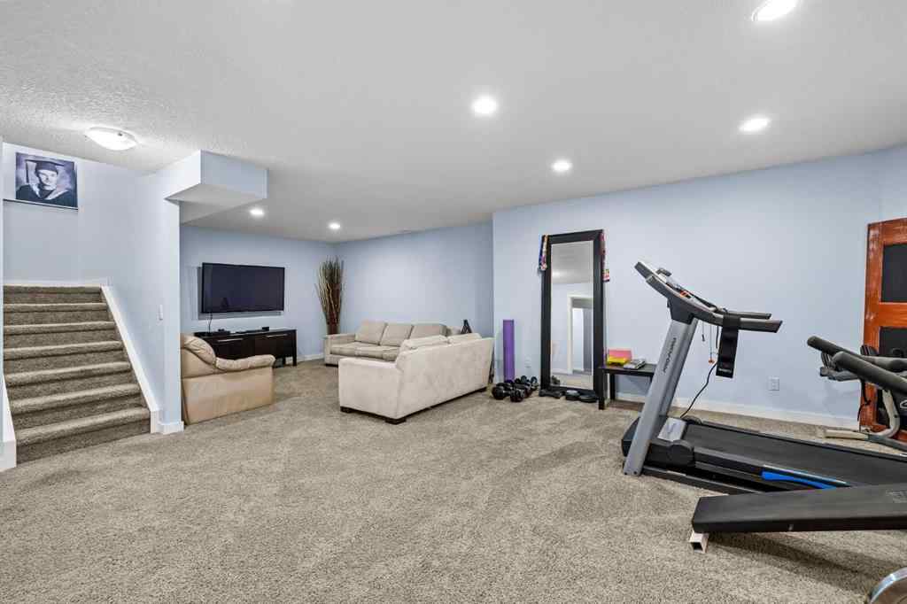 MLS® A2255701 - 22 West Pointe Manor  in West Pointe Cochrane, Residential