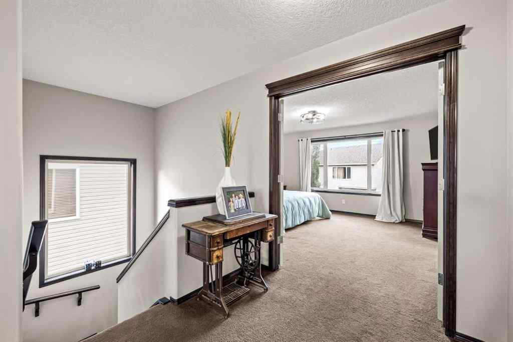 MLS® A2255701 - 22 West Pointe Manor  in West Pointe Cochrane, Residential