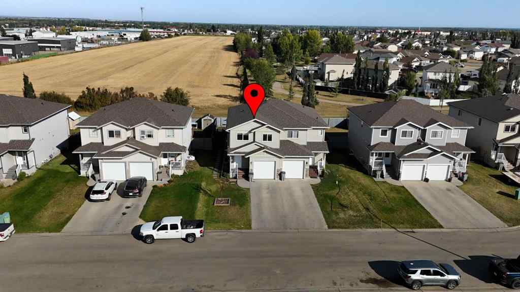 MLS® A2255714 - 7421 112 Street  in Westpointe Grande Prairie, Residential