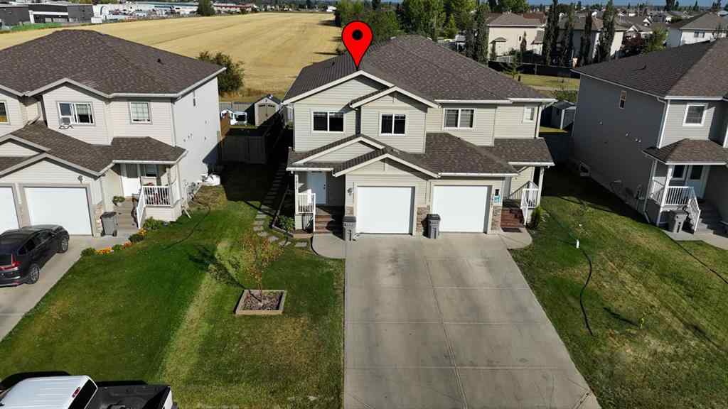 MLS® A2255714 - 7421 112 Street  in Westpointe Grande Prairie, Residential