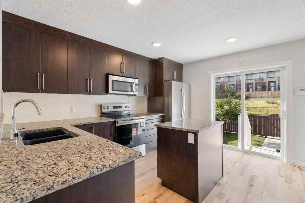 MLS® A2255737 - 119 Aspen Hills Drive SW in Aspen Woods Calgary, Residential