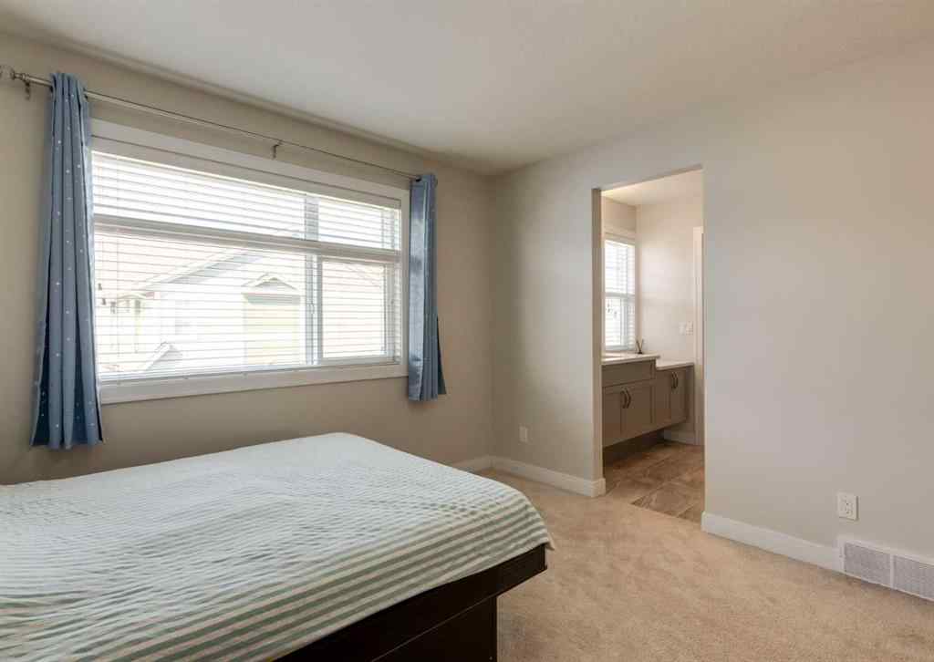 MLS® A2255741 - 833 85 Street SW in West Springs Calgary, Residential