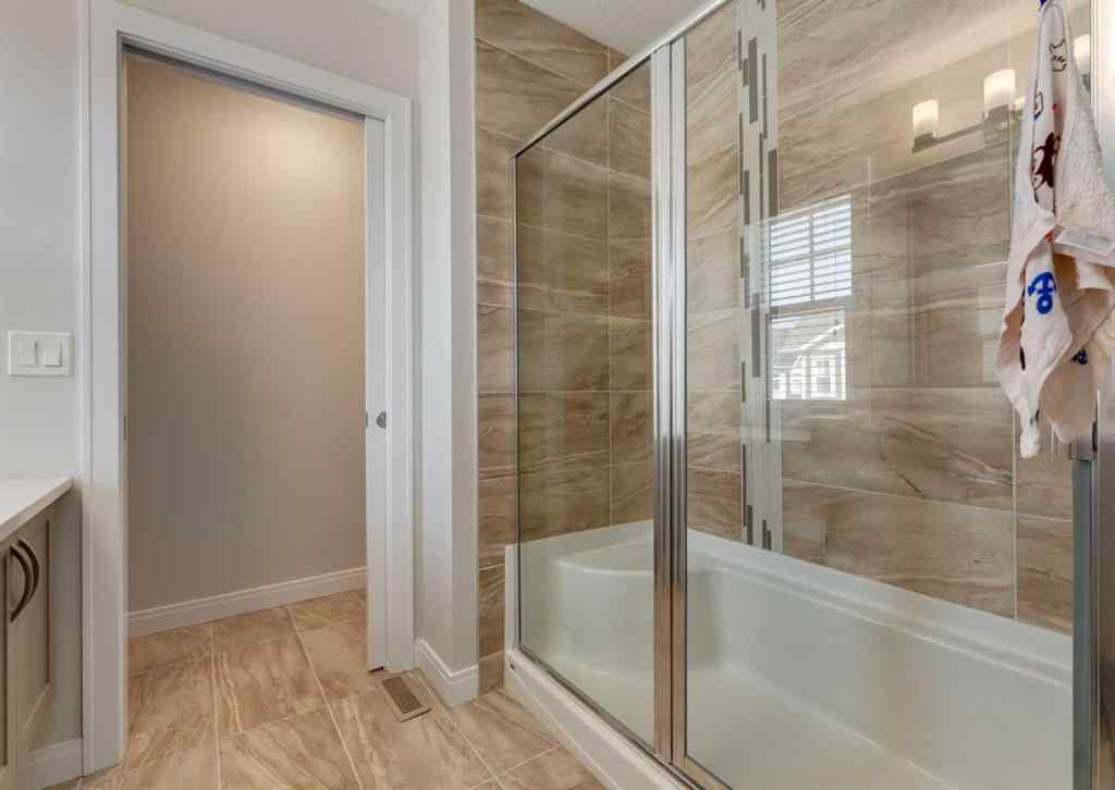 MLS® A2255741 - 833 85 Street SW in West Springs Calgary, Residential