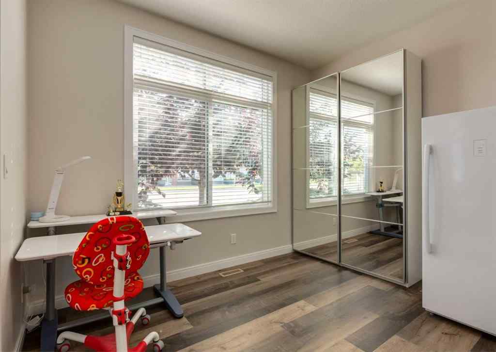 MLS® A2255741 - 833 85 Street SW in West Springs Calgary, Residential