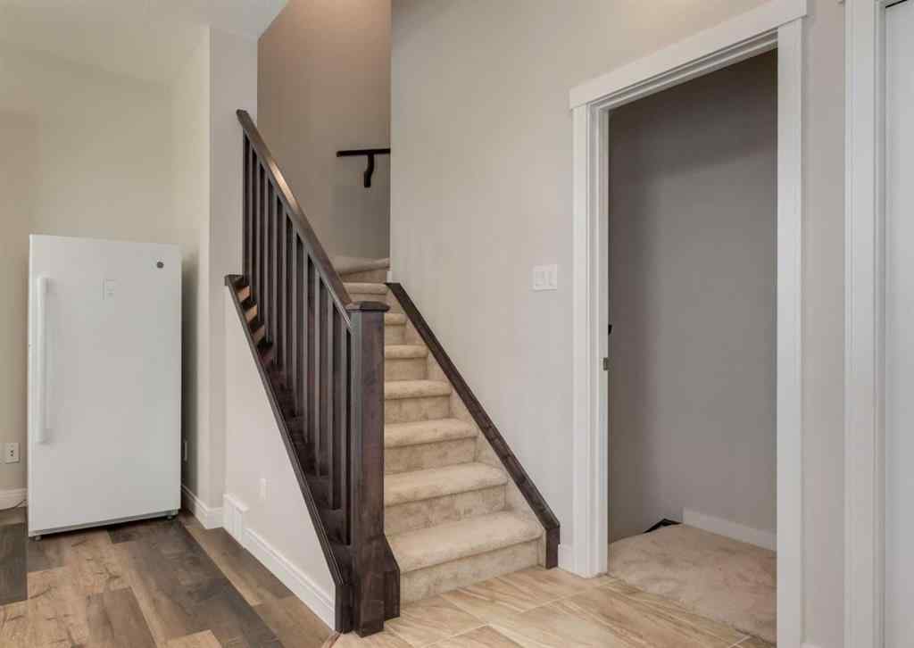 MLS® A2255741 - 833 85 Street SW in West Springs Calgary, Residential