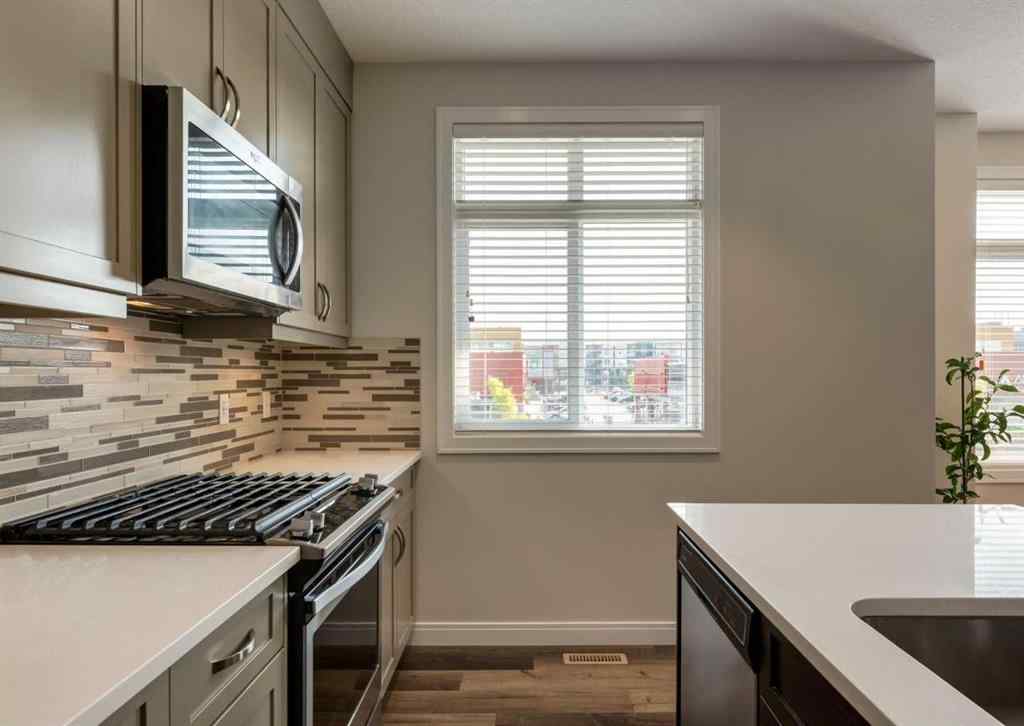 MLS® A2255741 - 833 85 Street SW in West Springs Calgary, Residential