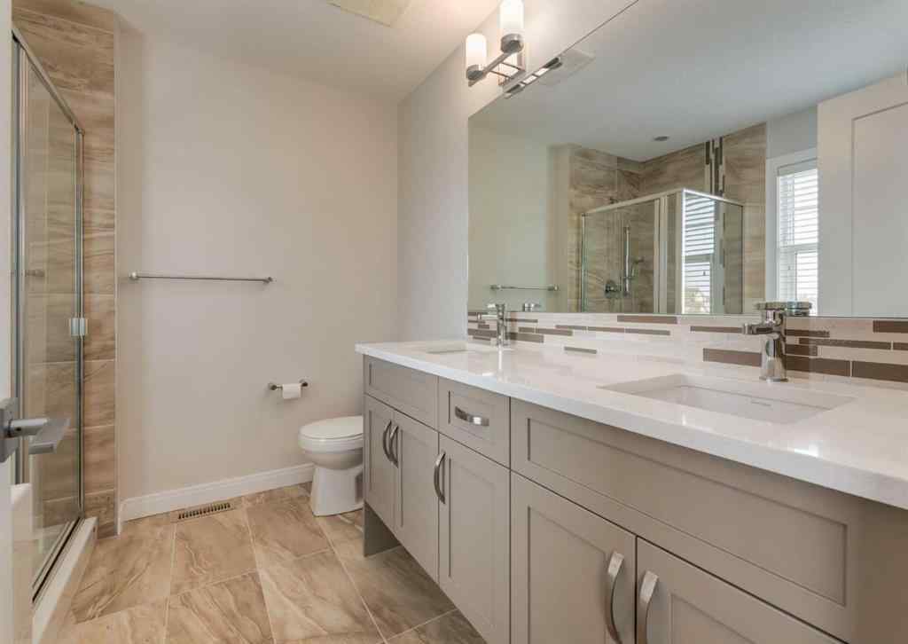 MLS® A2255741 - 833 85 Street SW in West Springs Calgary, Residential