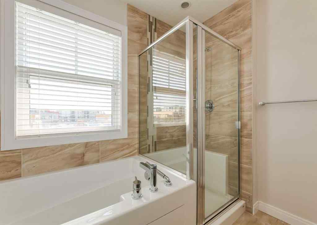 MLS® A2255741 - 833 85 Street SW in West Springs Calgary, Residential