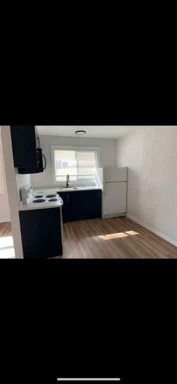 MLS® A2255743 - 9510 100 Avenue  in NONE Sexsmith, Multi-Family