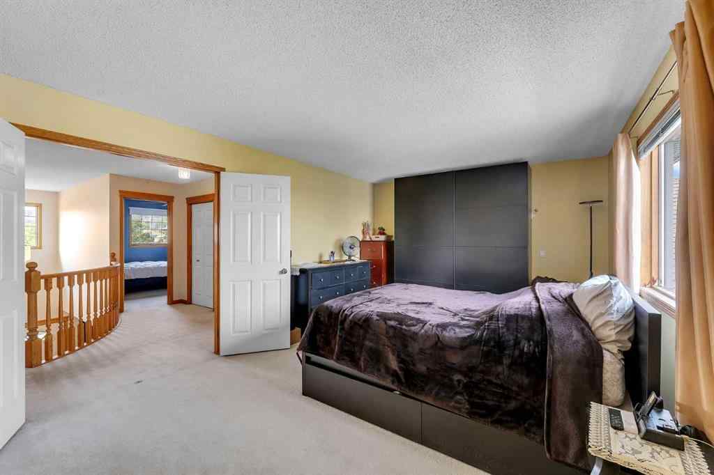 MLS® A2255755 - 220 Edgeridge Gardens NW in Edgemont Calgary, Residential