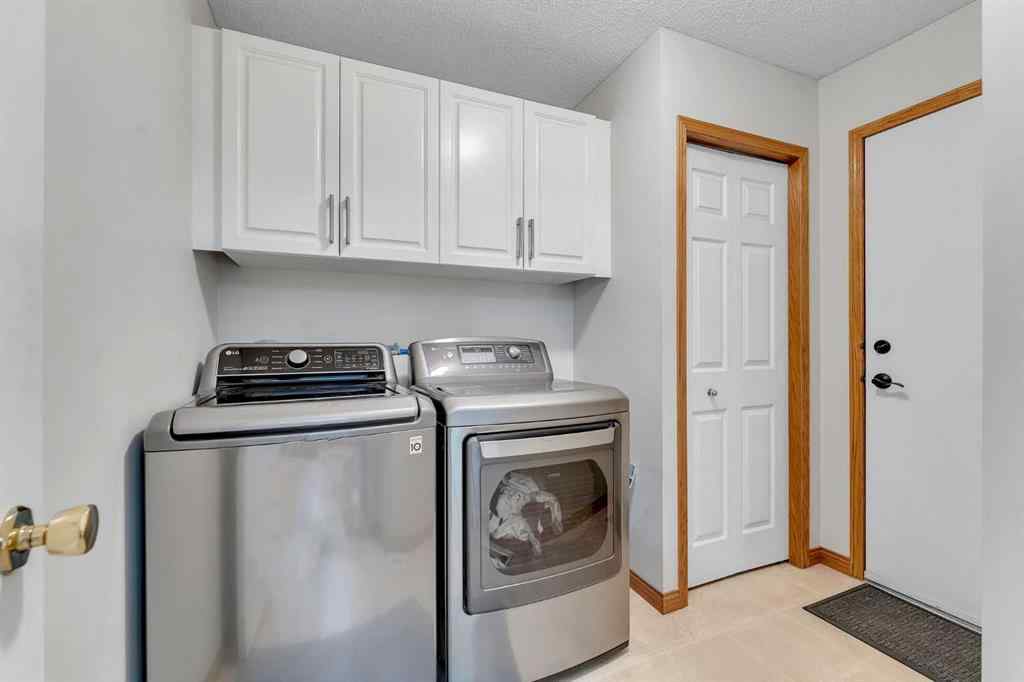 MLS® A2255755 - 220 Edgeridge Gardens NW in Edgemont Calgary, Residential