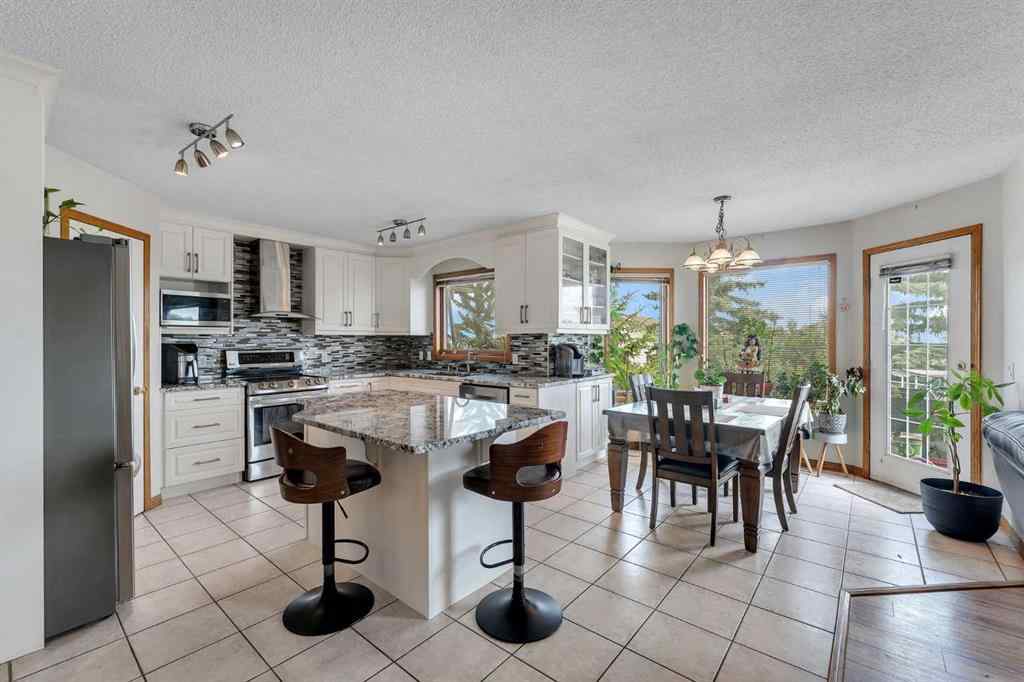 MLS® A2255755 - 220 Edgeridge Gardens NW in Edgemont Calgary, Residential