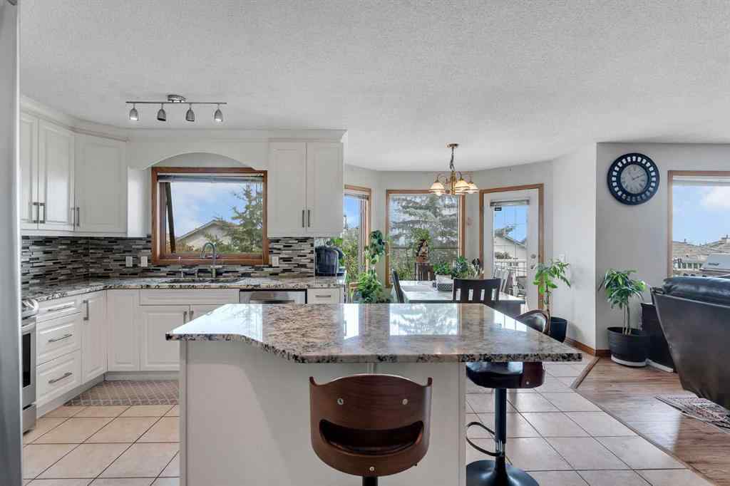 MLS® A2255755 - 220 Edgeridge Gardens NW in Edgemont Calgary, Residential