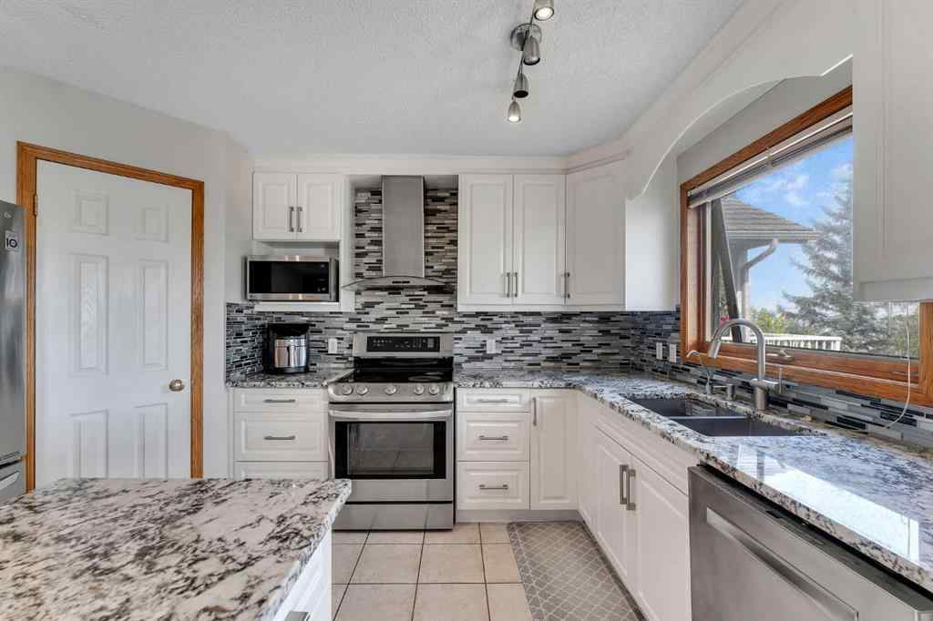 MLS® A2255755 - 220 Edgeridge Gardens NW in Edgemont Calgary, Residential