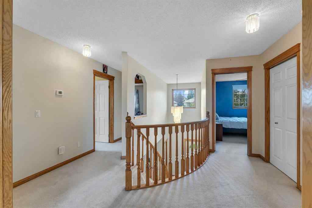 MLS® A2255755 - 220 Edgeridge Gardens NW in Edgemont Calgary, Residential