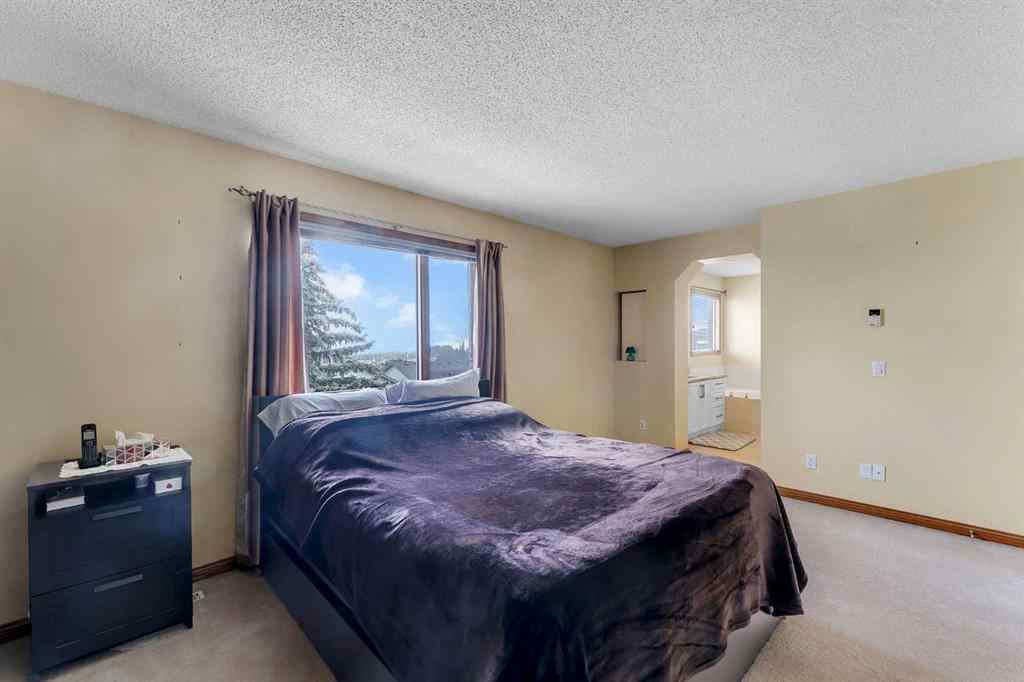MLS® A2255755 - 220 Edgeridge Gardens NW in Edgemont Calgary, Residential