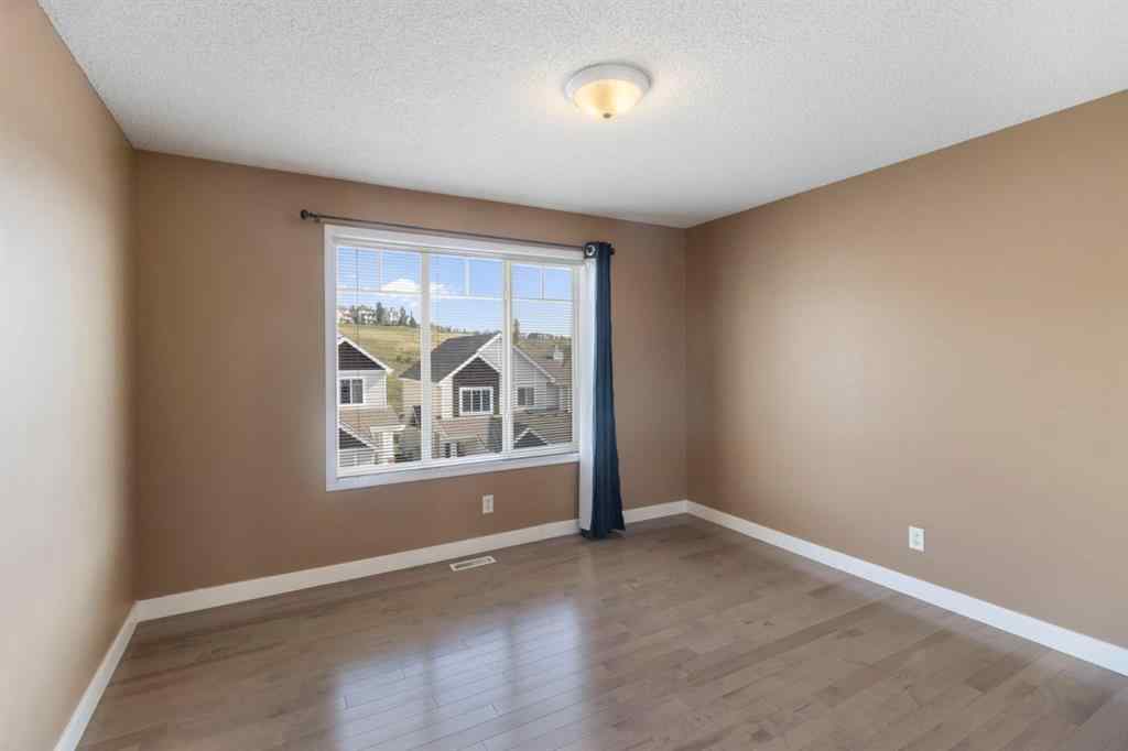 MLS® A2255756 - 144 Hidden Creek Gardens NW in Hidden Valley Calgary, Residential